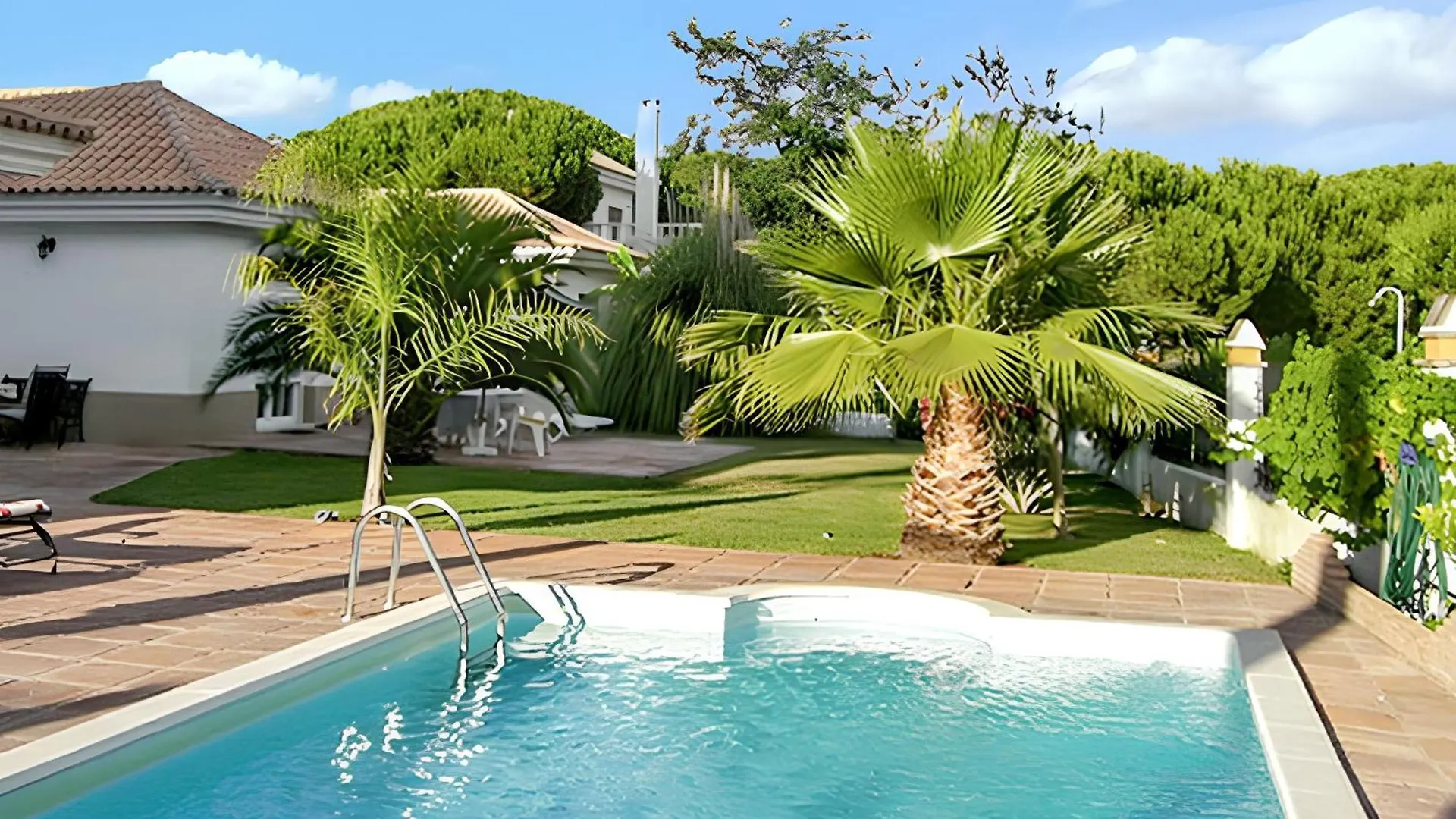 Elegant Villa In Nuevo Portil With Shared Pool
